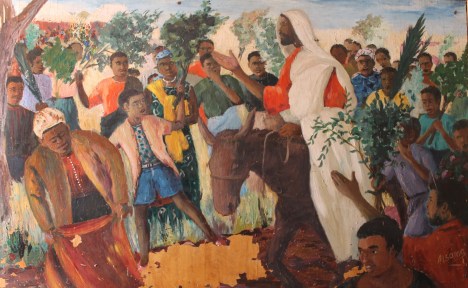 palm-sunday-an_african_jesus_christ_s_triumphal_entry_into_jerusalem_riding_on_a_donkey_to_the_enthusiasm_of_the_crowds.jpg